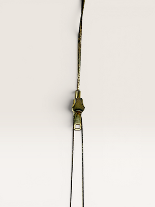 Gold Colored Zipper Necklace Bolo Tie