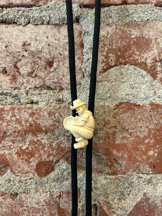 Gold Panner Carving Bolo Tie